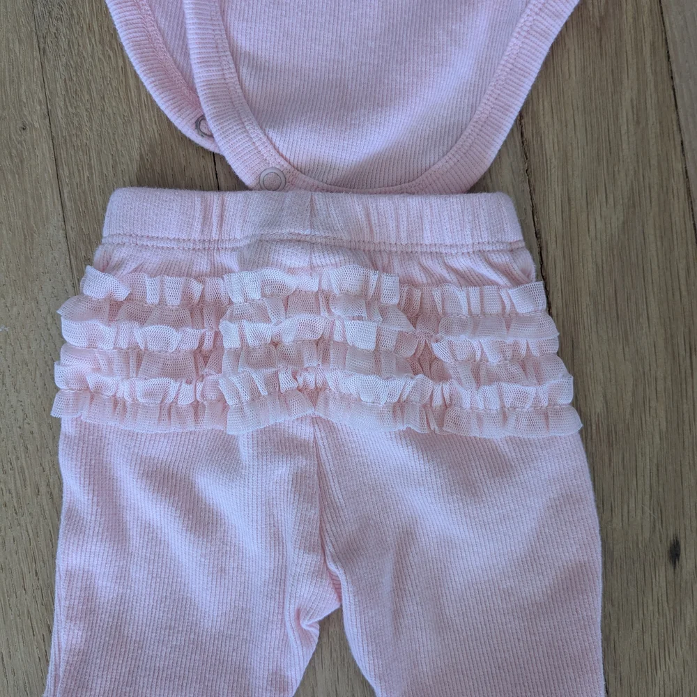 Pink Ruffled Baby Outfit